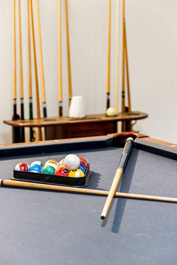 Game zone with pool table and entertainment area